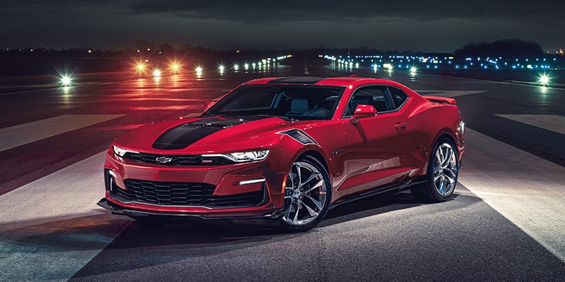 Red camaro with black stripe
